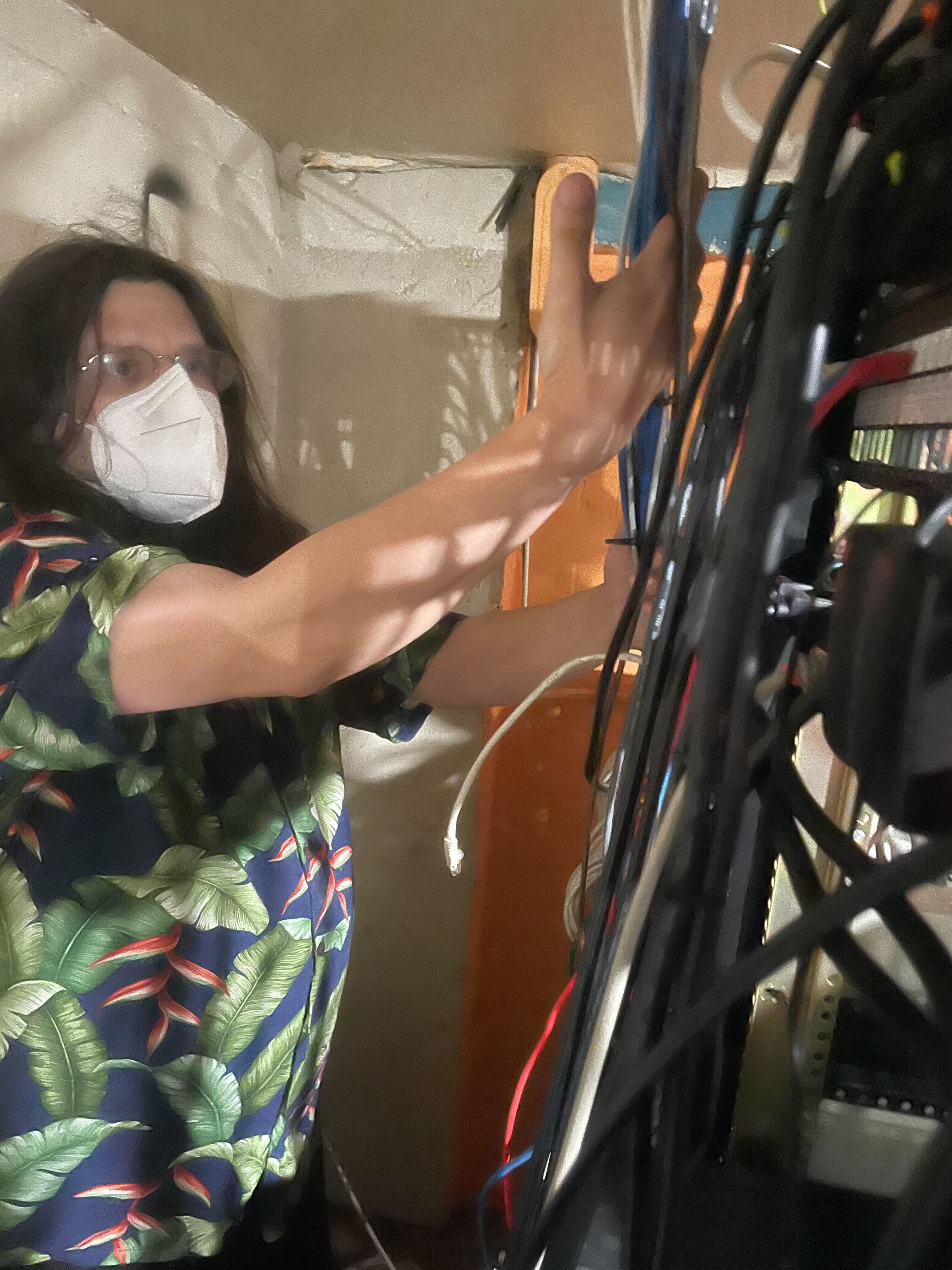 Cprossu demonstrating the wiring of our current infra upstairs