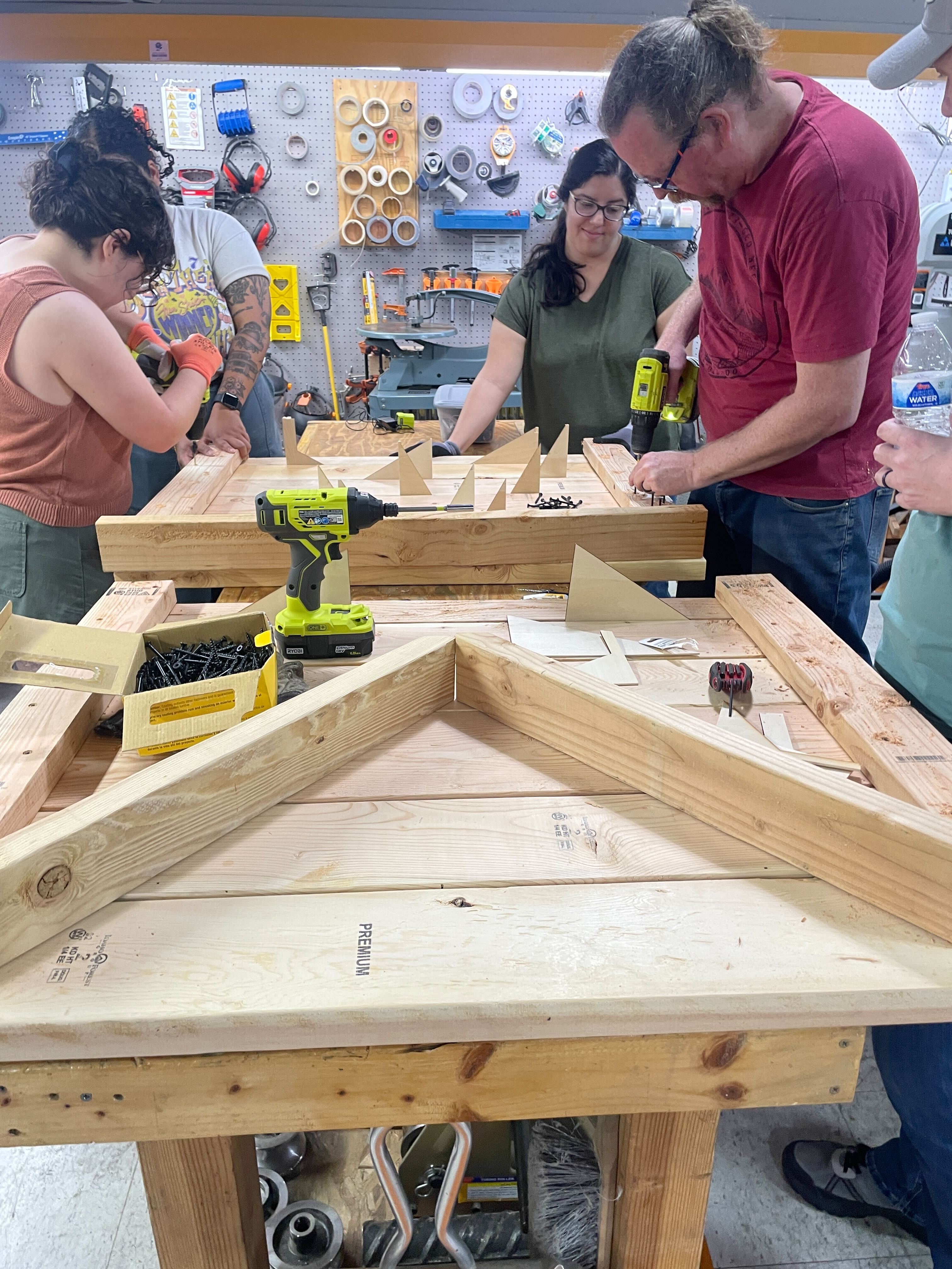 Planter frames being screwed together in the wood shop