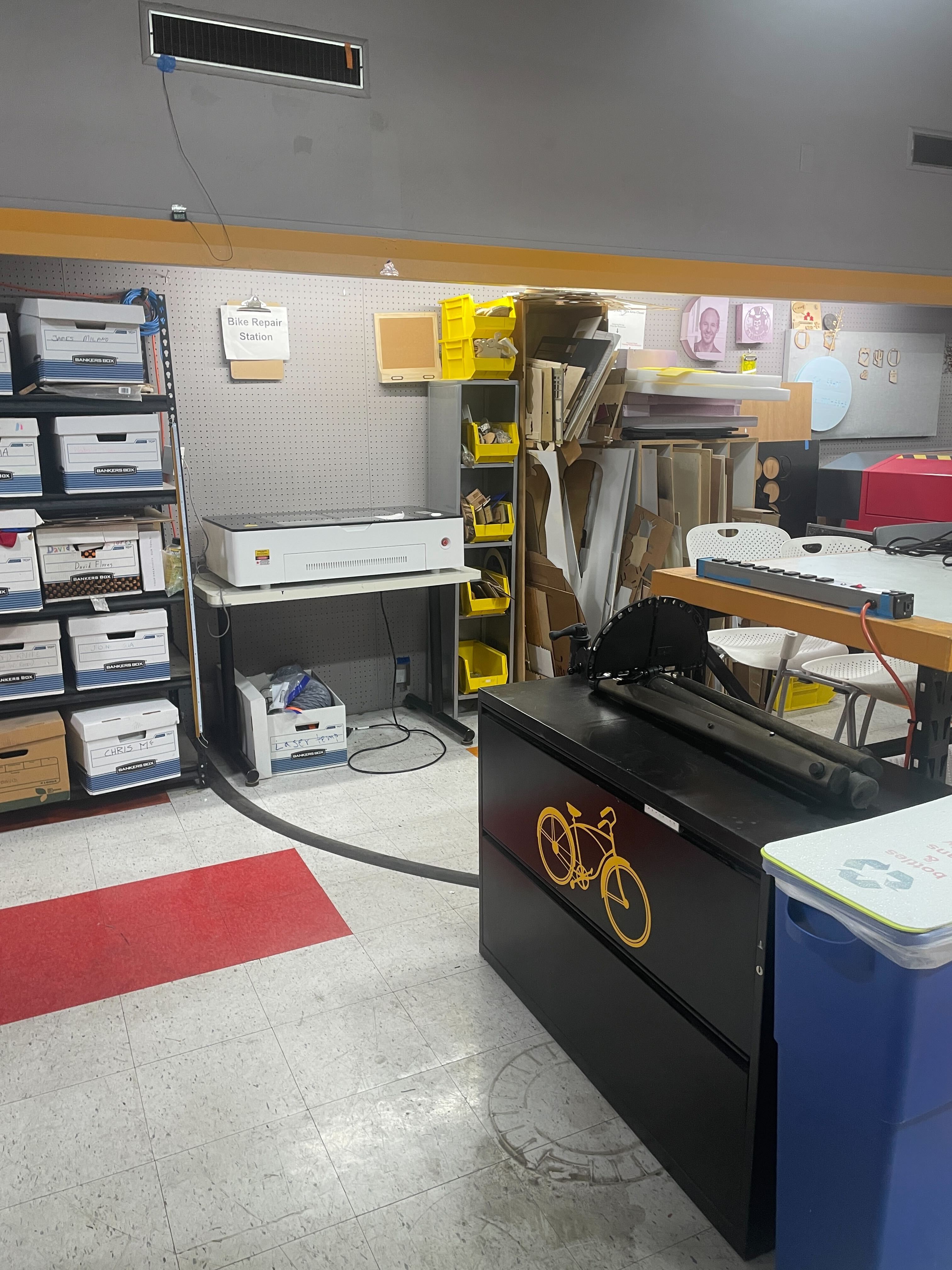 New laser cutter table and the relocated bike repair drawers